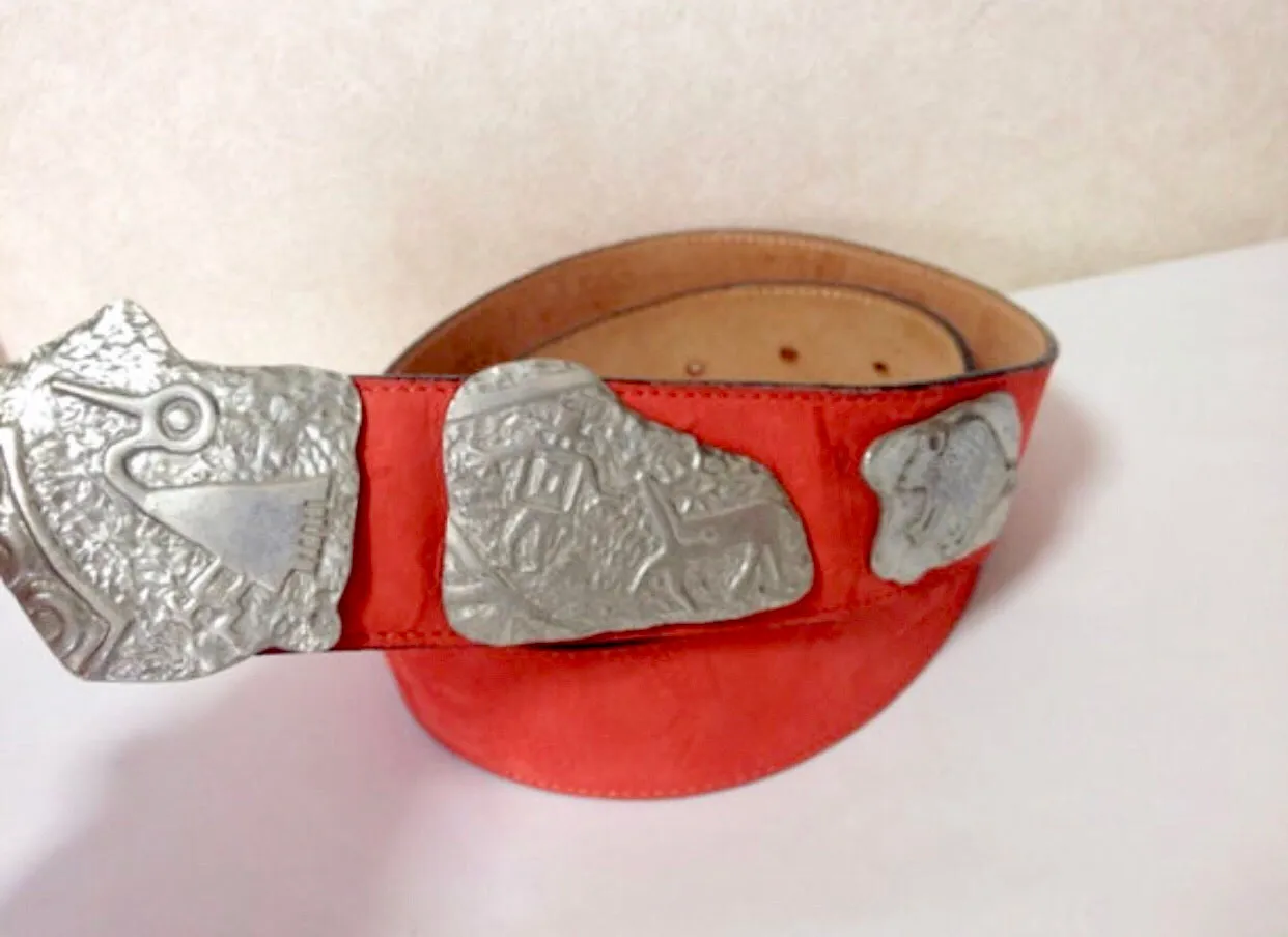 Vintage Carlos Falchi red suede leather belt with silver fun and unique animal motifs. Great masterpiece. US28, 29, 30, 31, 32, 33